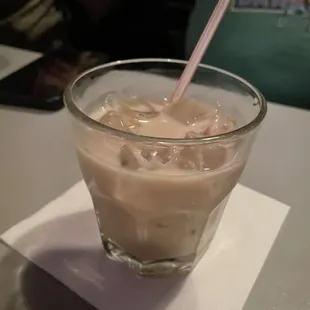 a drink in a glass with a straw