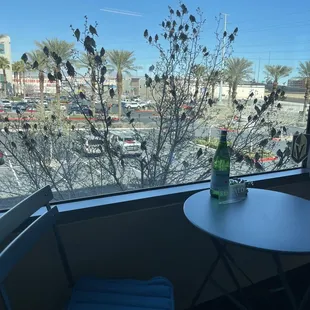a table and chairs with a view