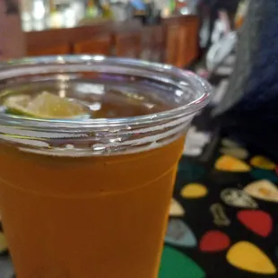 a drink in a plastic cup