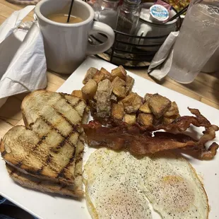 The NO. 1 with eggs over medium, bacon and white toast.
