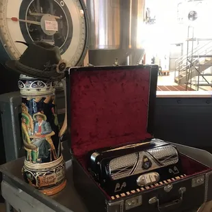 a beer can and a case on a table