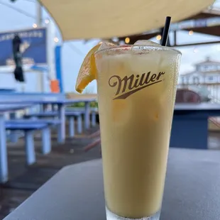 a drink with a slice of lemon