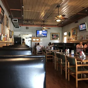 Walls lined with beer tap handles. Lots of booths