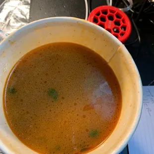 a bowl of soup on a desk