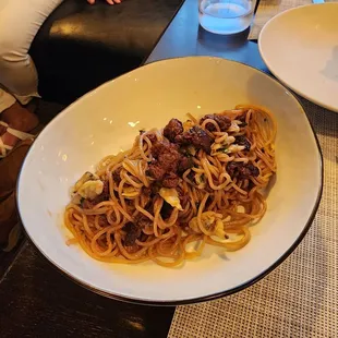Spaghetti with baby clams and nduja. Unbelievably good with deep, well-developed flavors.