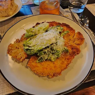 Cotoletta di Pollo - chicken breast with Caesar salad.