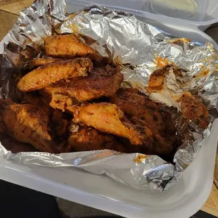 a tray of chicken wings
