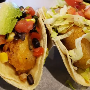 Portobello mushroom taco &amp; fried avocado taco ($5 each). Both were good.