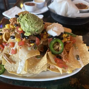 This is a 1/2 order of the chicken nachos with everything - holy smokes!