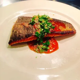 a piece of fish on a plate