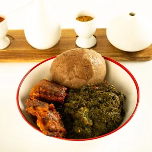 Savor our Afang soup: Okazi leaves, succulent meat, crayfish, pepper, waterleaf, periwinkles. Ideal with fufu &amp; your choice of proteins