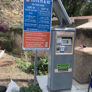 Adjacent parking lot (Lot 11) appears to be limited to resident/employee permits only (Nov 2023)