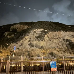 a view of a mountain at night