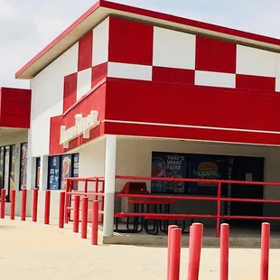 Outside. Small outdoor eating area. There are more seats inside. This diner is inside the gas station/store.