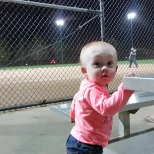 Cara rooting for Dad, Uncle Scott and cousin Matt.