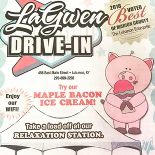 a pig holding an ice cream cone