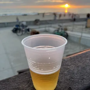 a plastic cup of beer