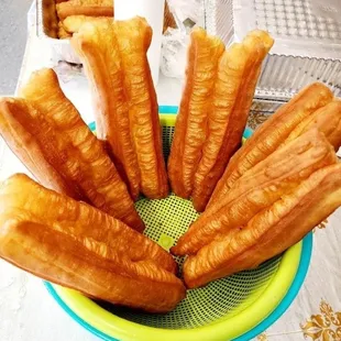 Youtiao (Chinese name) Eciakuai - like long doughnut but crunchy on the outside and soft on the inside.