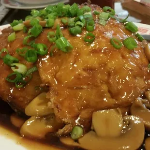 Egg Fu Young with Mushroom Gravy: Bean sprouts with whipped egg, pan-fried and topped with mushroom gravy