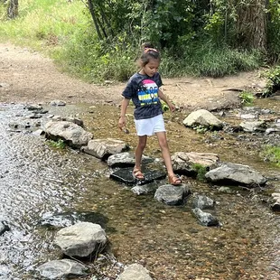 Hiking over the stream.