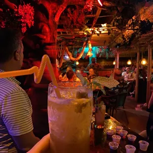 a person holding a drink