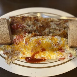 an omelet and bread on a plate