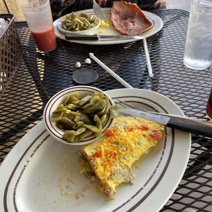 My farmers omelette, my wife's omelette and ham.