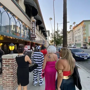 a group of people dressed in costumes