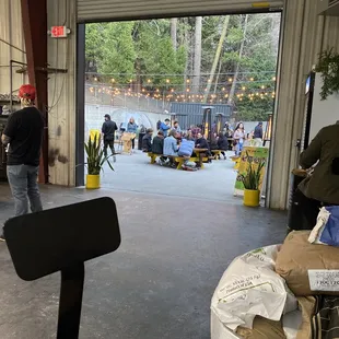 a group of people in a warehouse