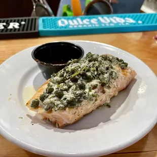 Salmon with lemon caper butter.