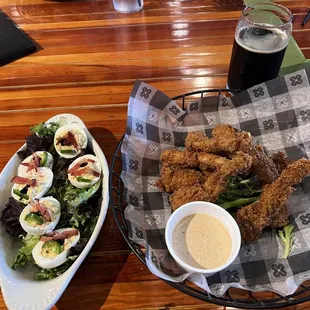 Legs and Eggs! They have frog legs on their everyday menu! And the deviled eggs are tasty.