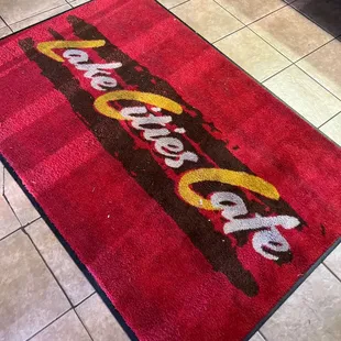 a red area rug on the floor