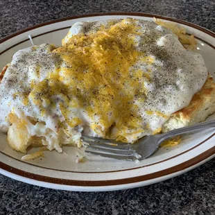 Southern Scrambler.. oh my goodness it's perfections! (Biscuits, Gravy, Egg, Sausage, Hash-Brown, and Cheese) $8.25