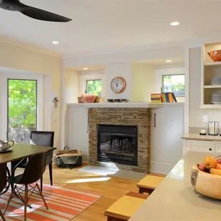 a dining room with a fireplace