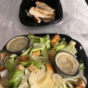 a salad in a plastic container