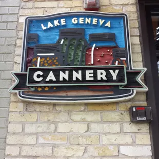 a sign on a brick building