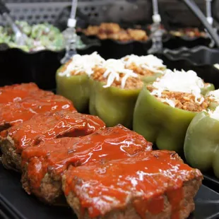 Our deli case is stocked with hand made salads and entrees like our meatloaves and stuffed green peppers.