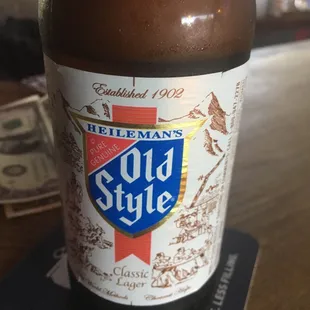 a bottle of cold style beer