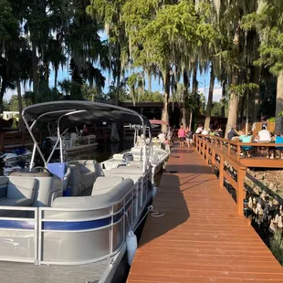 a boat docked at a dock