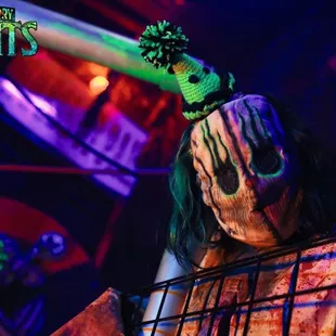 a creepy clown in a cage