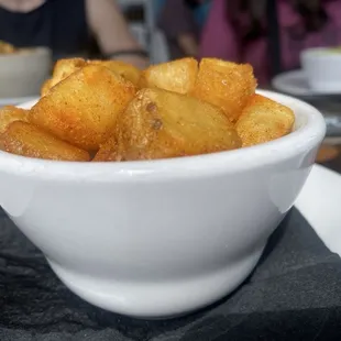 Side of diced potatoes.