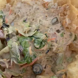 Taco salad soaked in dressing