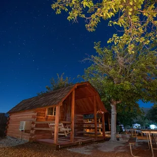 a lot of stars and a beautiful wooden house