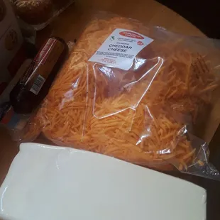 Cheddar and mozarella cheese.