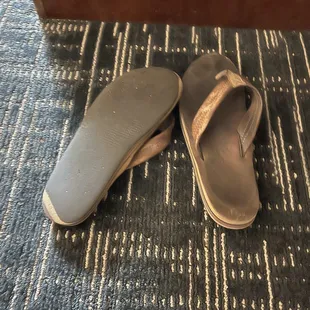 Nasty sandals left by the previous guest (I hope)
