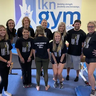 Some of our terrific staff are wearing their Childhood Cancer Awareness work shirts. We wear ours in loving memory of BJ Correll.