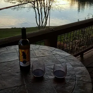 Enjoying the beautiful sunset on the deck at Lake of The Pines Clubhouse  cheers!