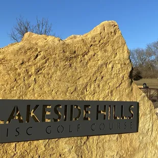 Beginning of disc golf--not pictured is parking near this stone sign