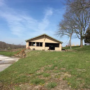 Filthy picnic area with dangerous broken wood inside
