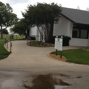 Clubhouse for the 18 hole facility. There's a 9 hole par three across the street.